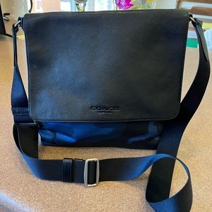 Coach crossbody bag. 11” x 11”. Exterior pocket and interior zip pocket.